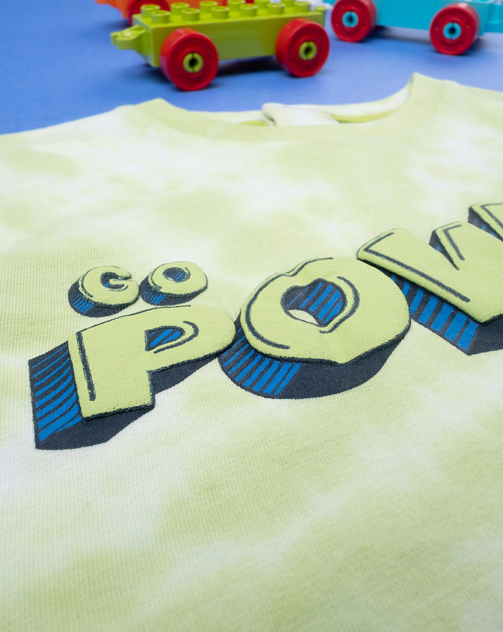 T-shirt bimbo tie-dye con stampa