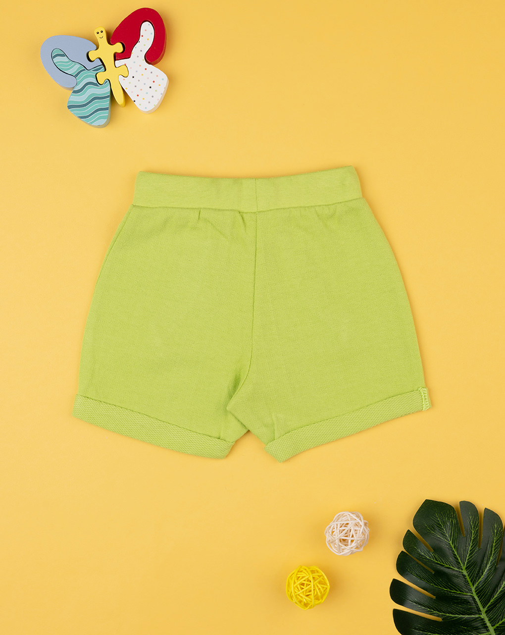 Bermuda bimbo verdi in felpina con tasca