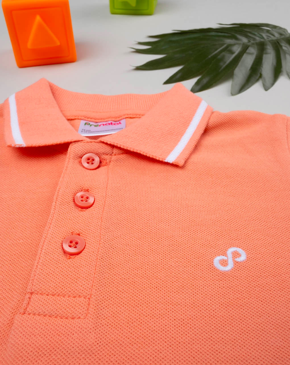Polo bimbo arancione