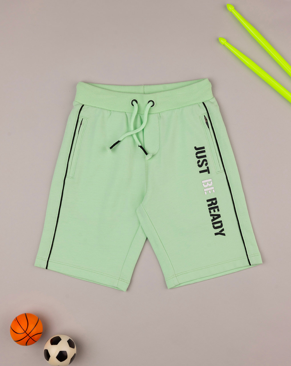 Shorts bambino verdi con stampa