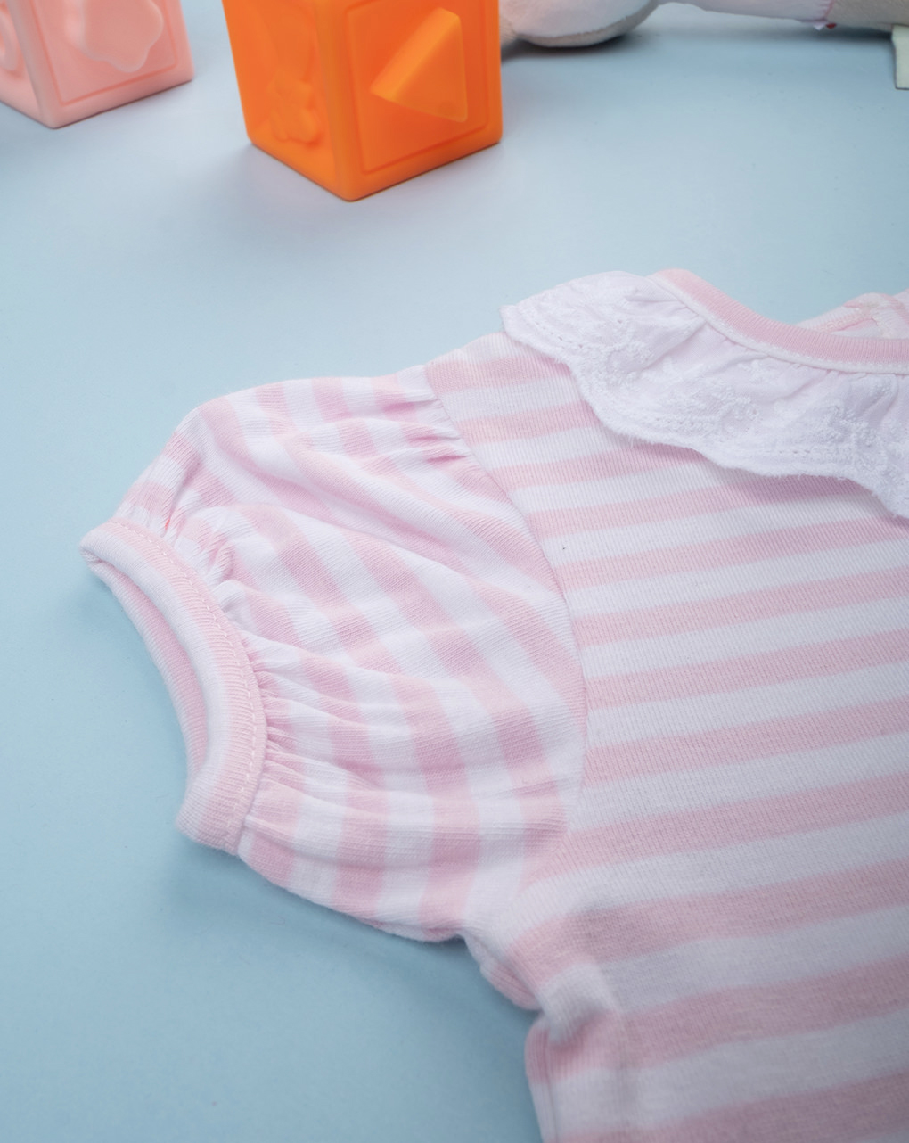 Body bimba rigato rosa con colletto