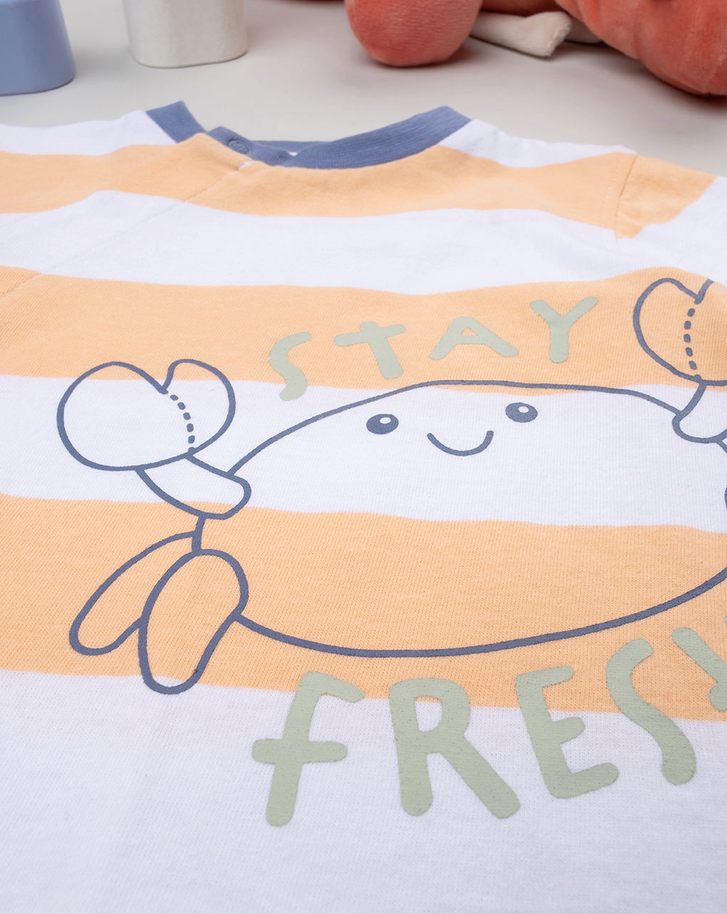 Tutina bimbo righe arancioni con stampa