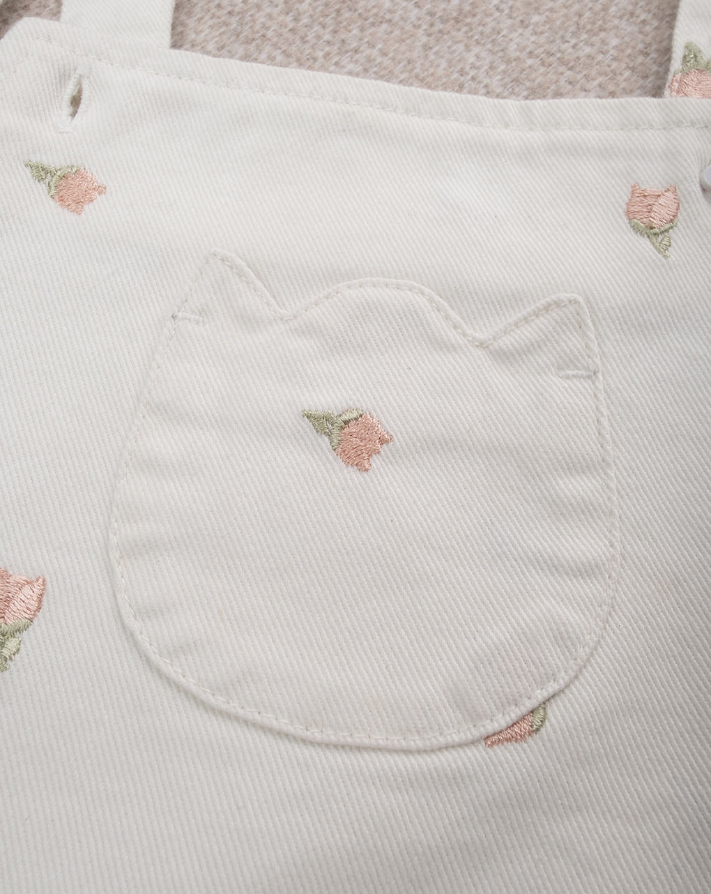 Salopette bimba panna con tulipani