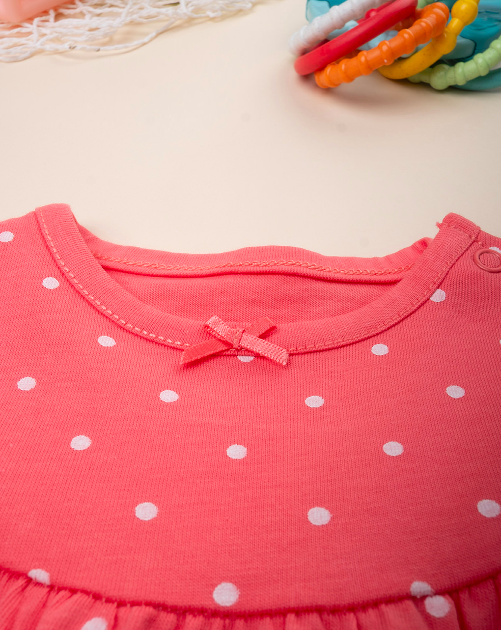 Pagliaccetto bimba corallo pois