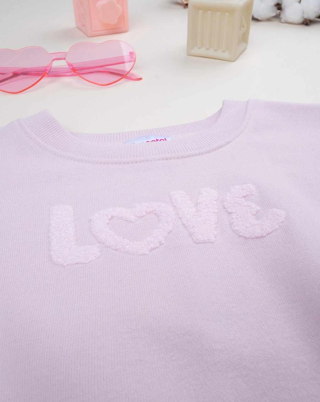 Falpa rosa con ricamo spugna