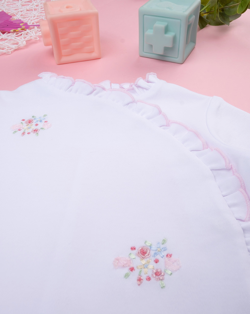 Tutina bimba bianca con bavaglino