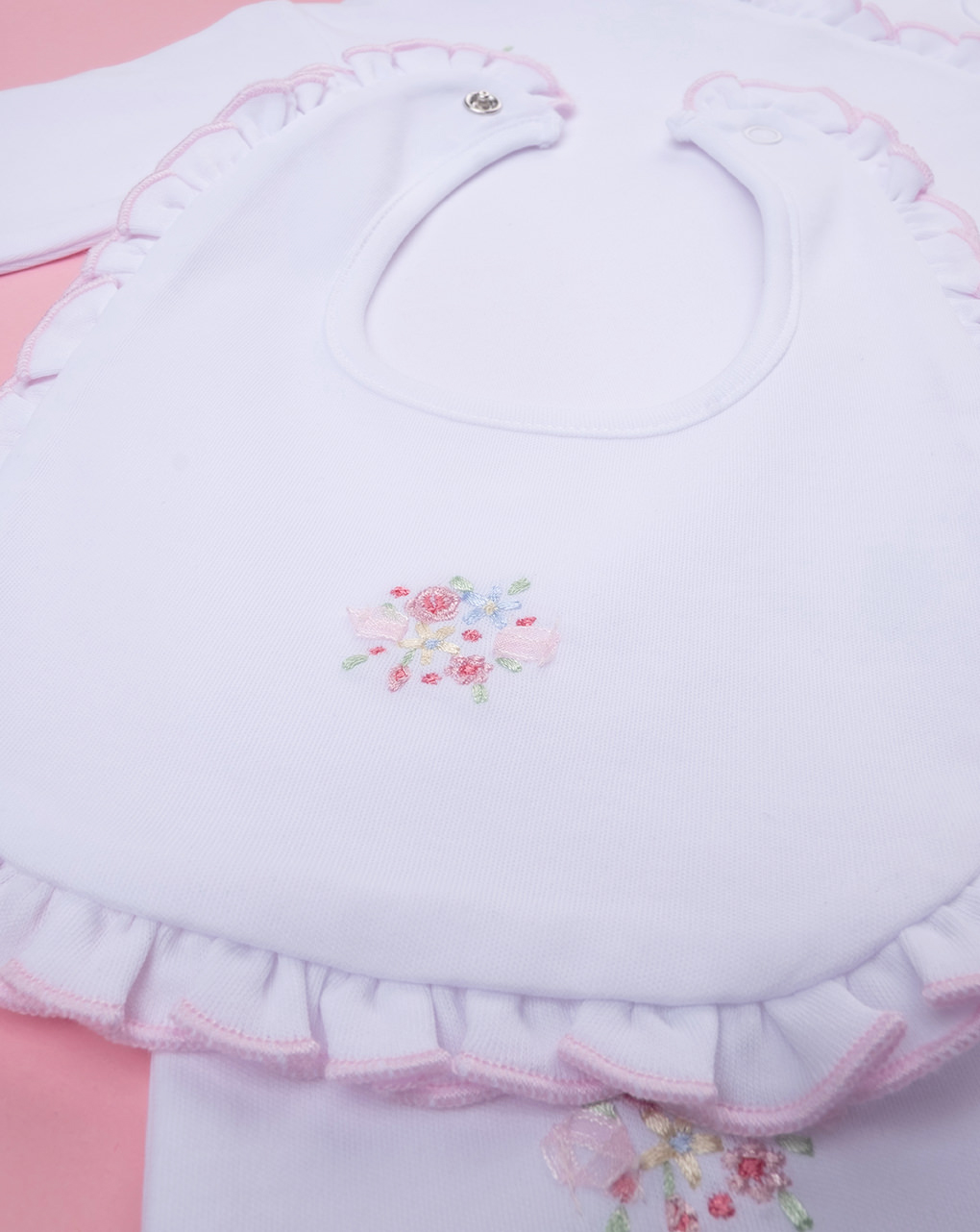 Tutina bimba bianca con bavaglino