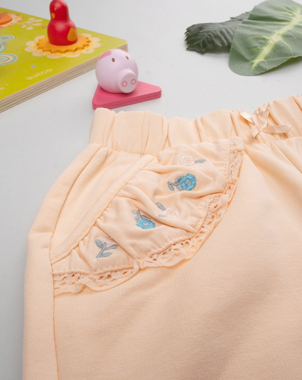 Pantalone bimba arancione con ricami