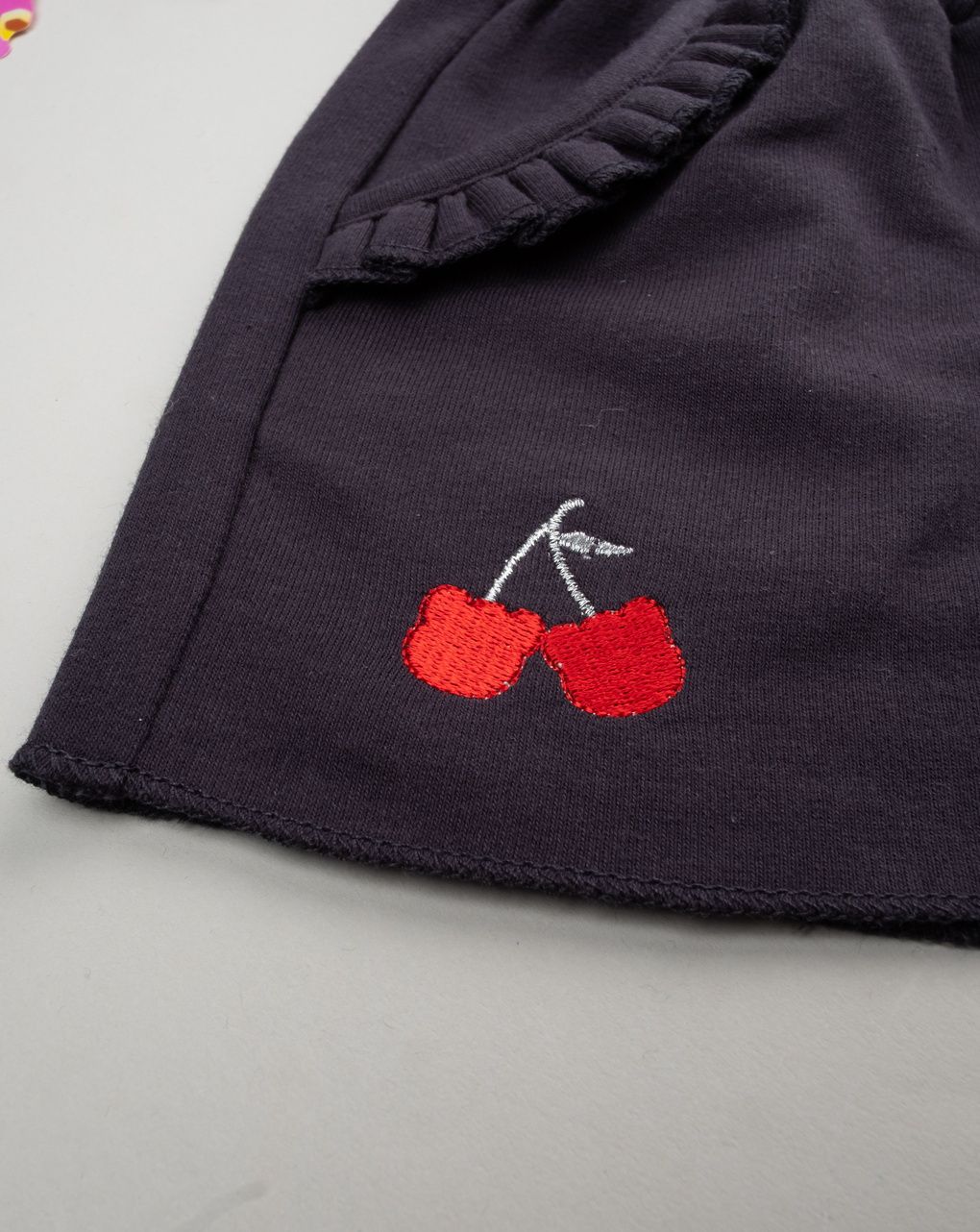 Shorts bimba neri ricami frutta