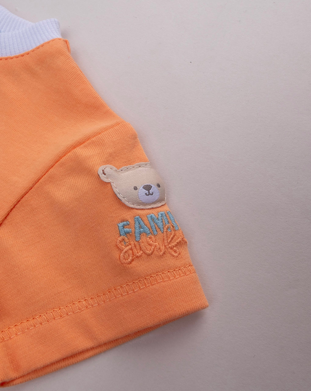 Completo corto bimbo azzurro/arancione orsetti