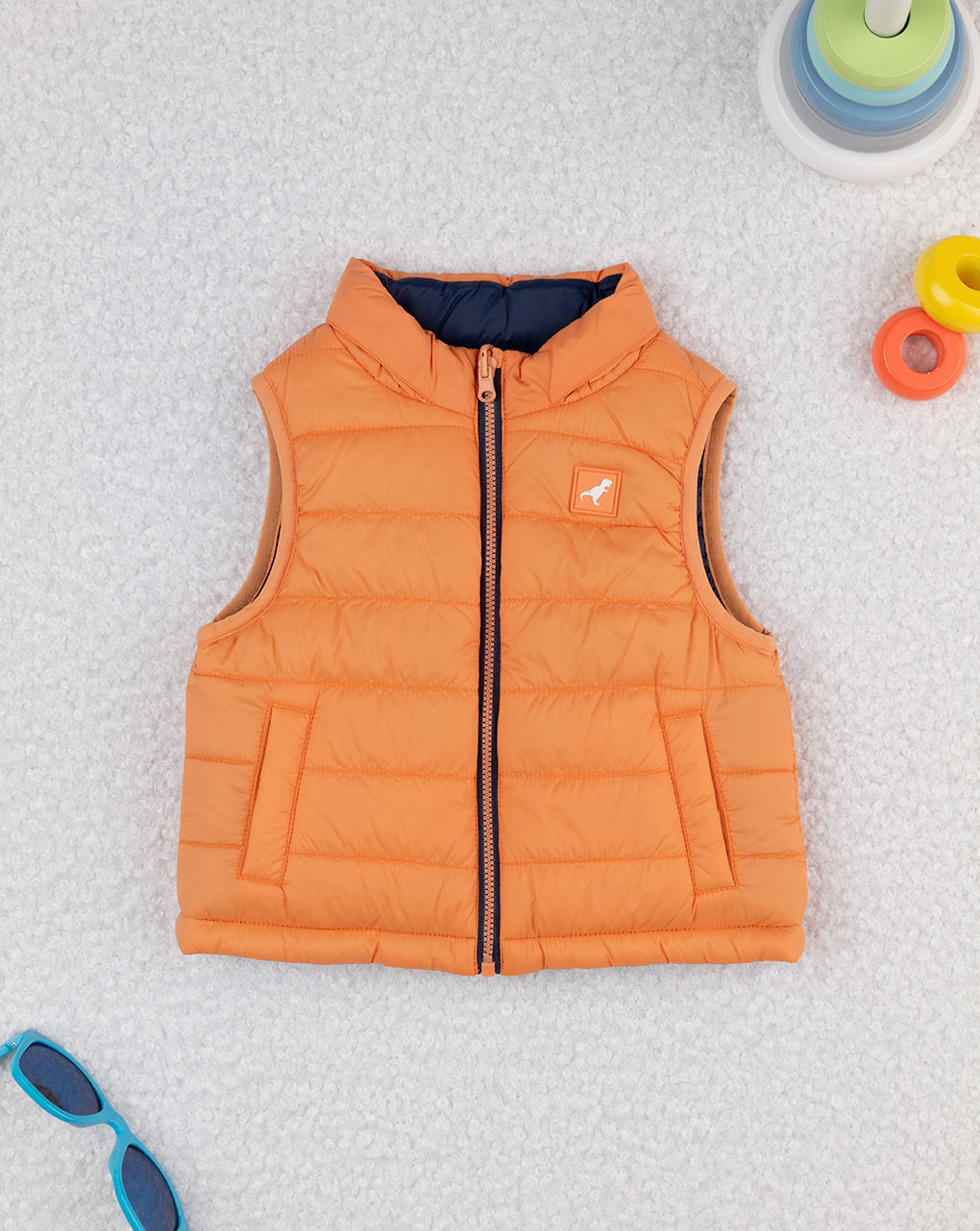 Piumino smanicato bimbo arancione