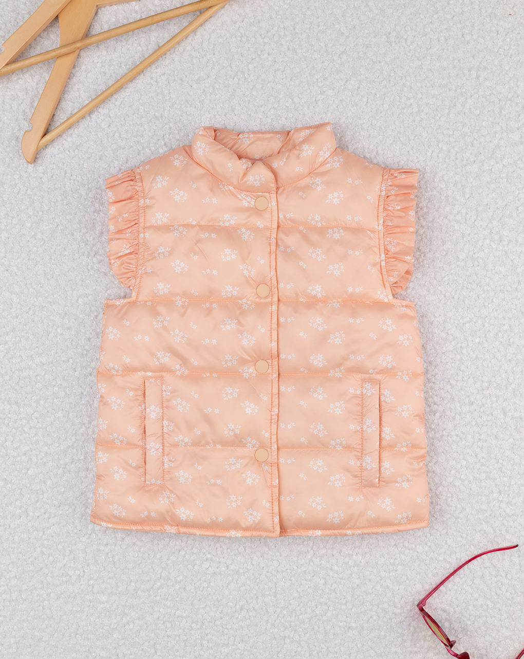 Piumino smanicato bimba arancione