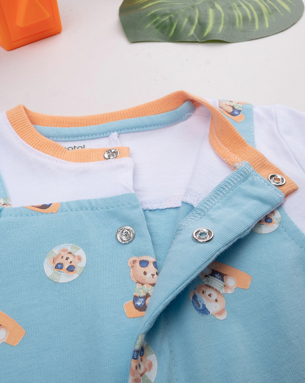 Pagliaccetto bimbo azzurro/bianco con stampa allover