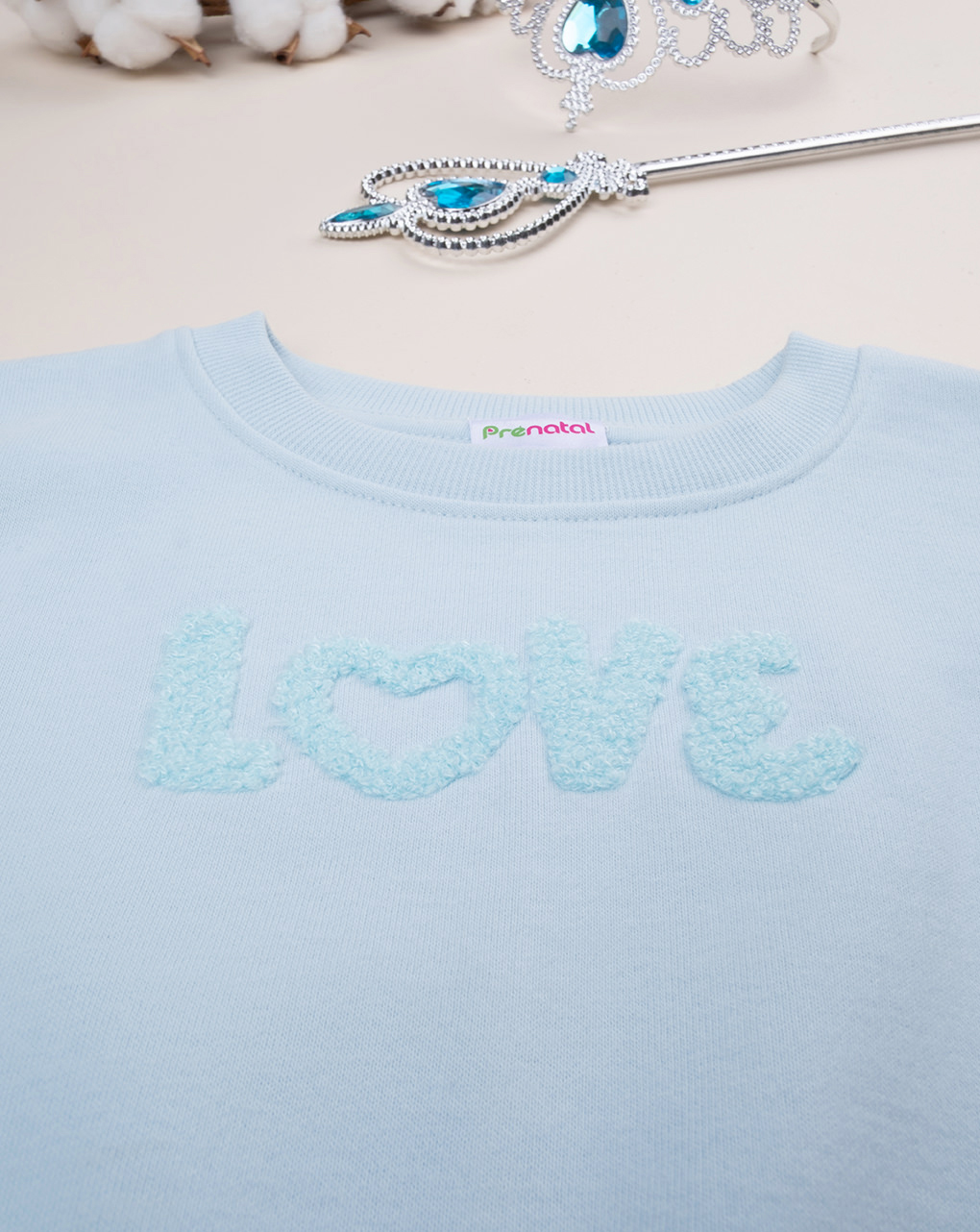 Felpa azzurra con ricamo spugna