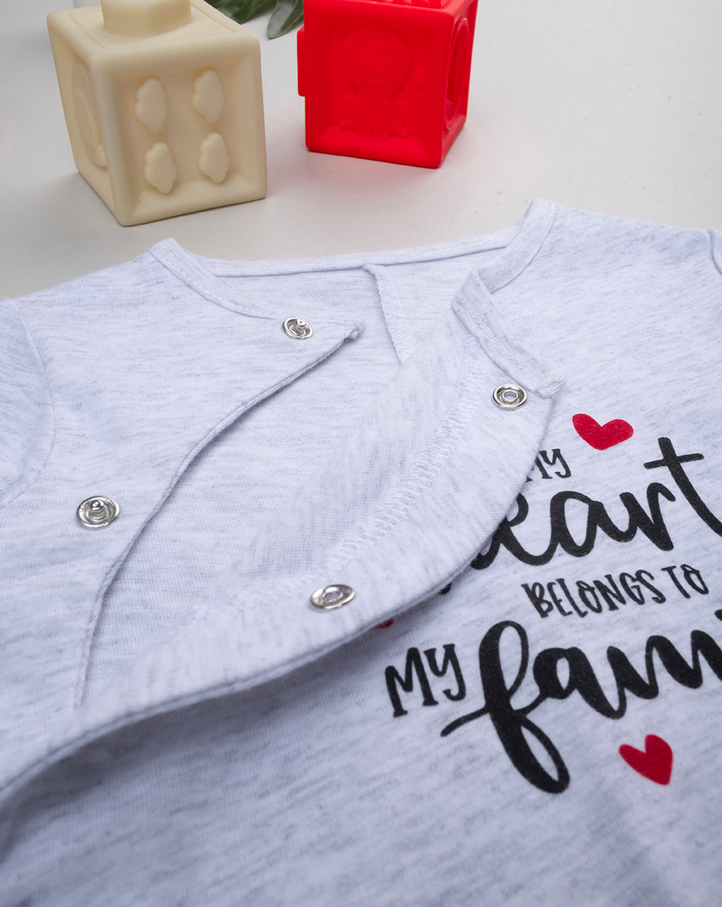 Tutina unisex grigia con scritta