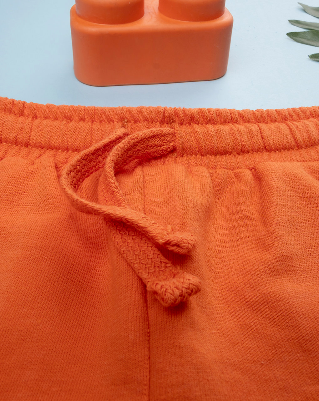 Shorts bimbo arancioni