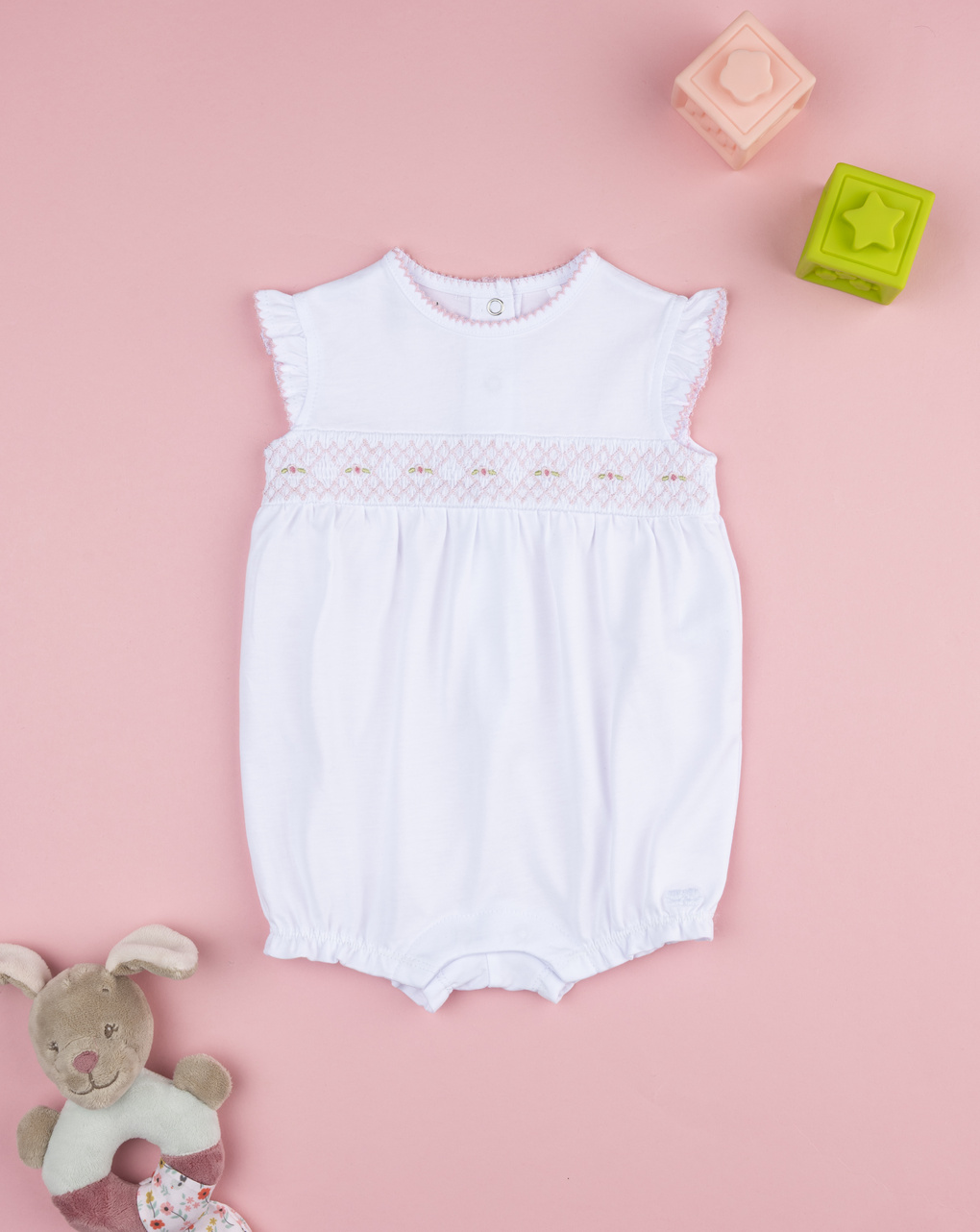 Pagliaccetto bimba bianco con greca