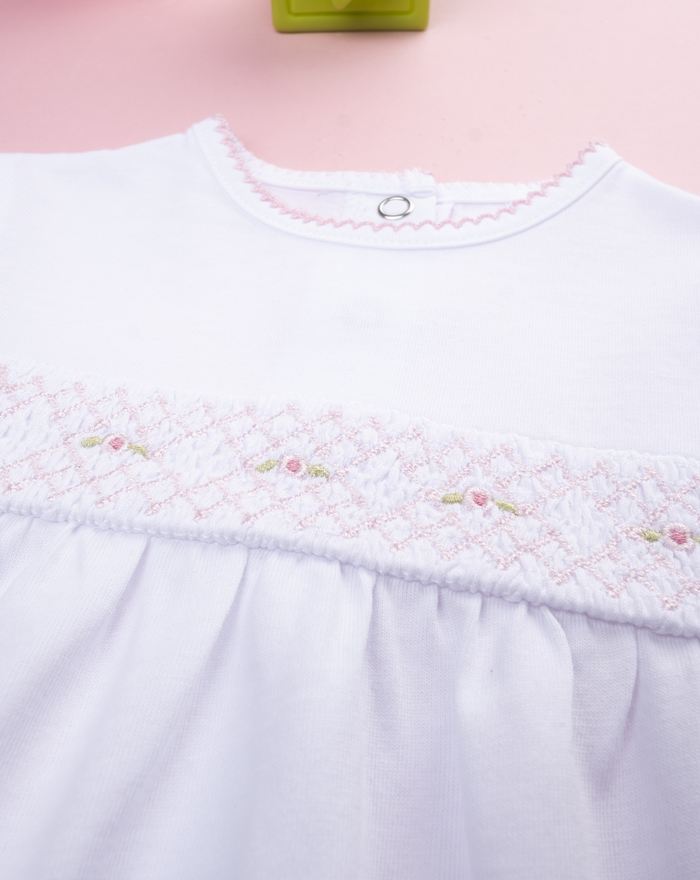 Pagliaccetto bimba bianco con greca