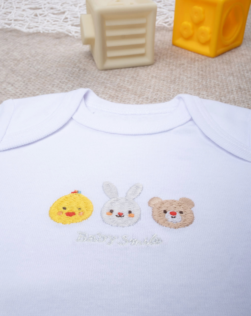 Body unisex bianco ricamo baby smile