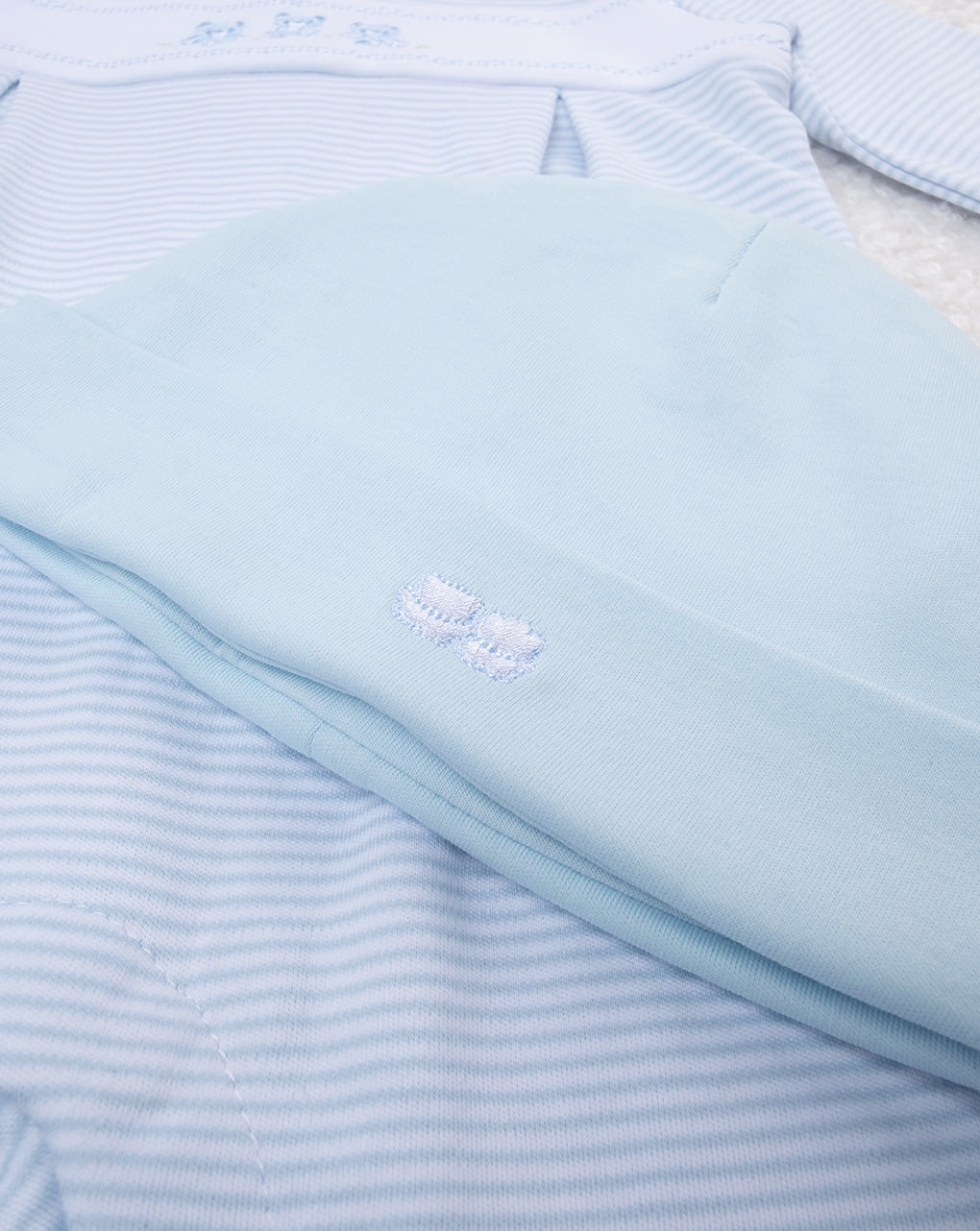 Completo bimbo tutina e cappellino azzurro