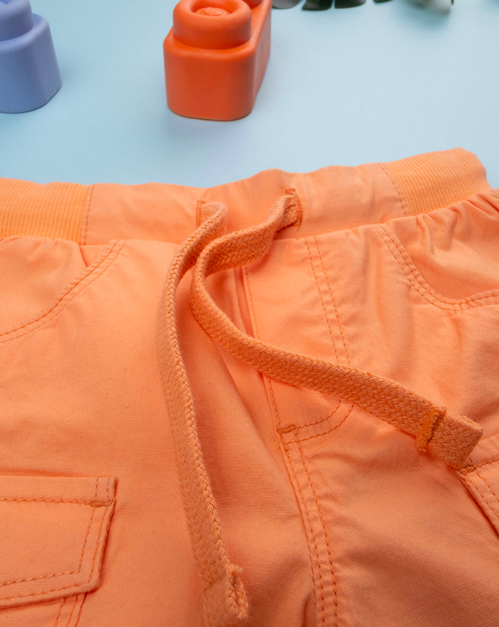 Shorts bimbo arancioni tasconi