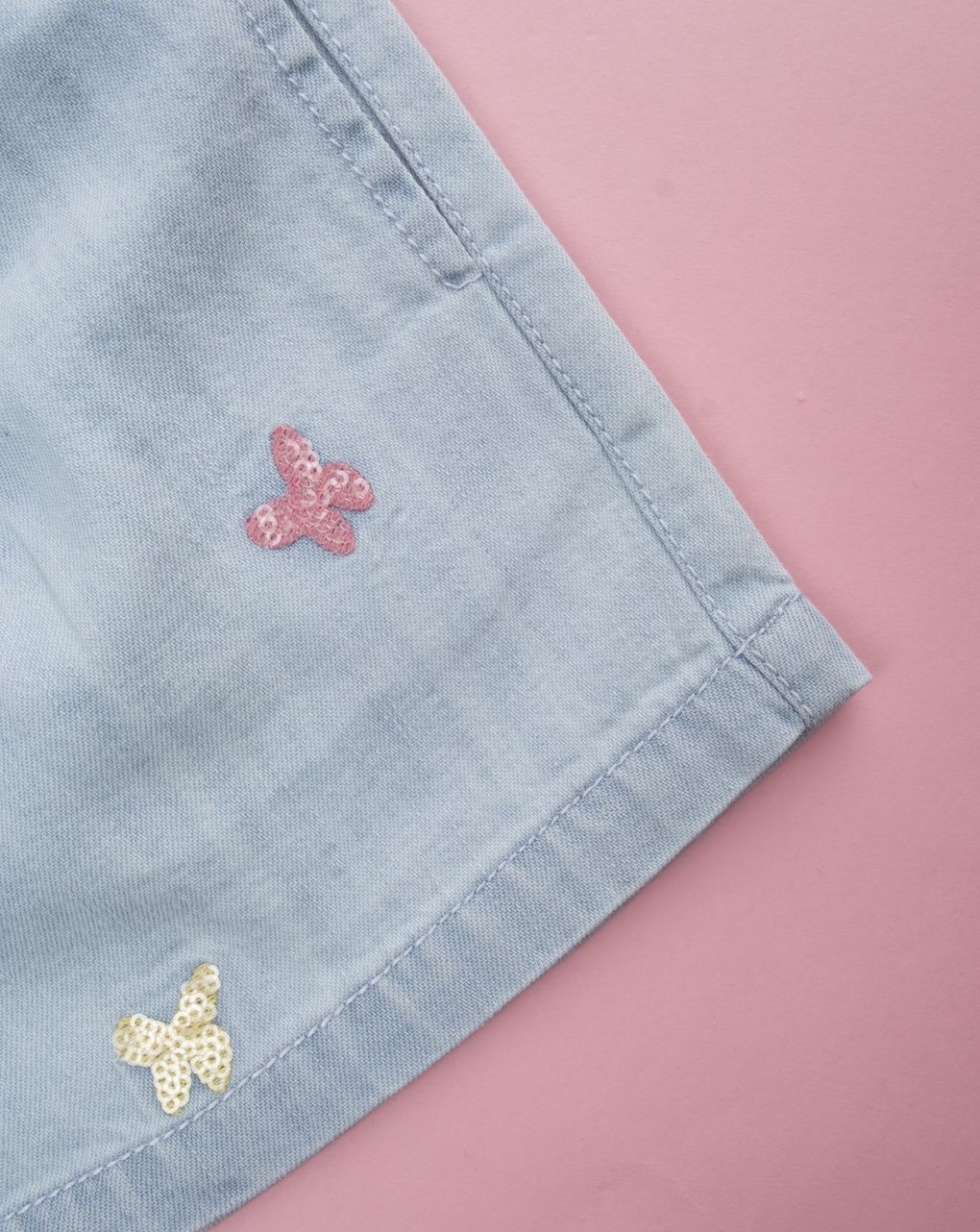Shorts denim bimba farfalle