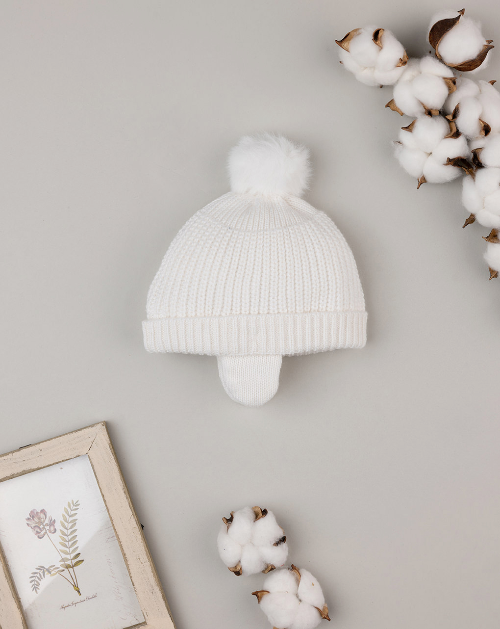 Cappello con pon pon