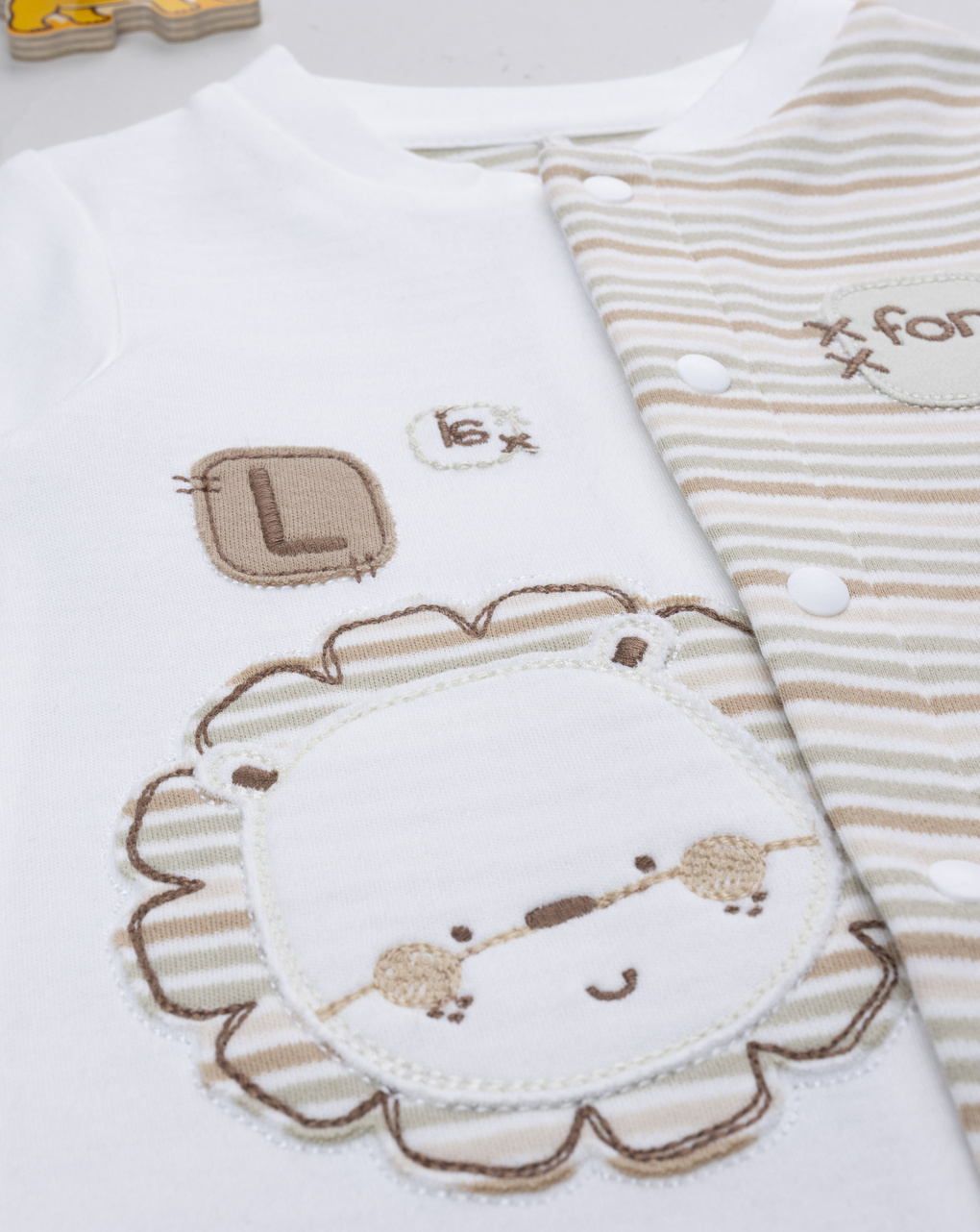 Tutina bimbo bicolor righe/lion