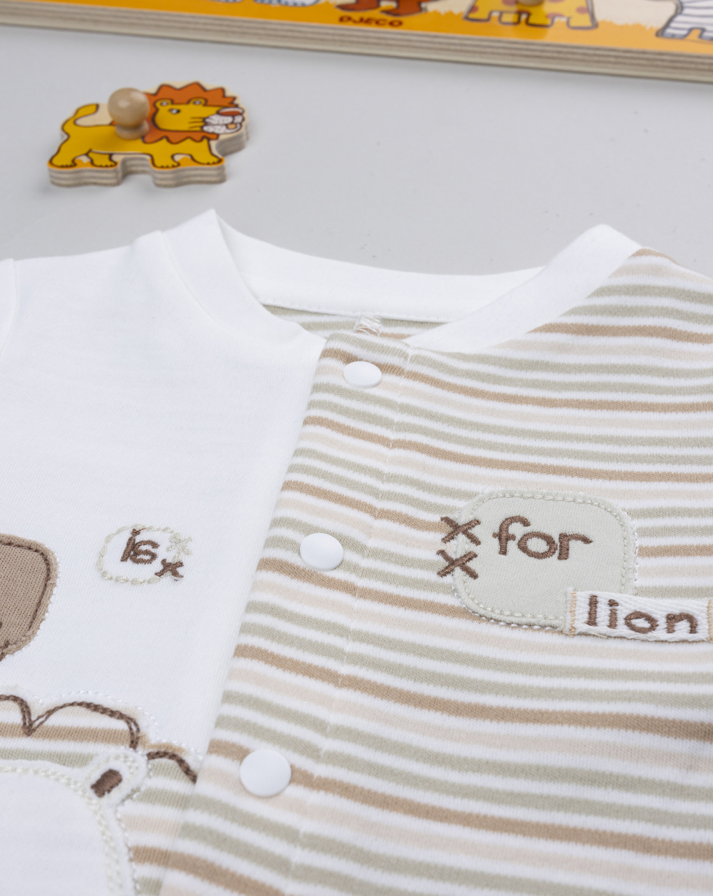 Tutina bimbo bicolor righe/lion