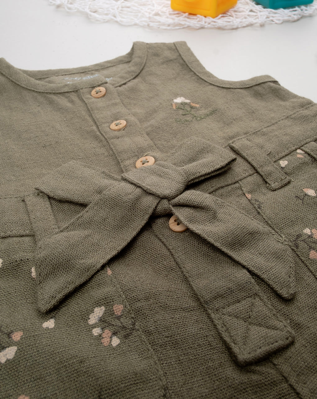 Pagliaccetto neonata verde misto lino