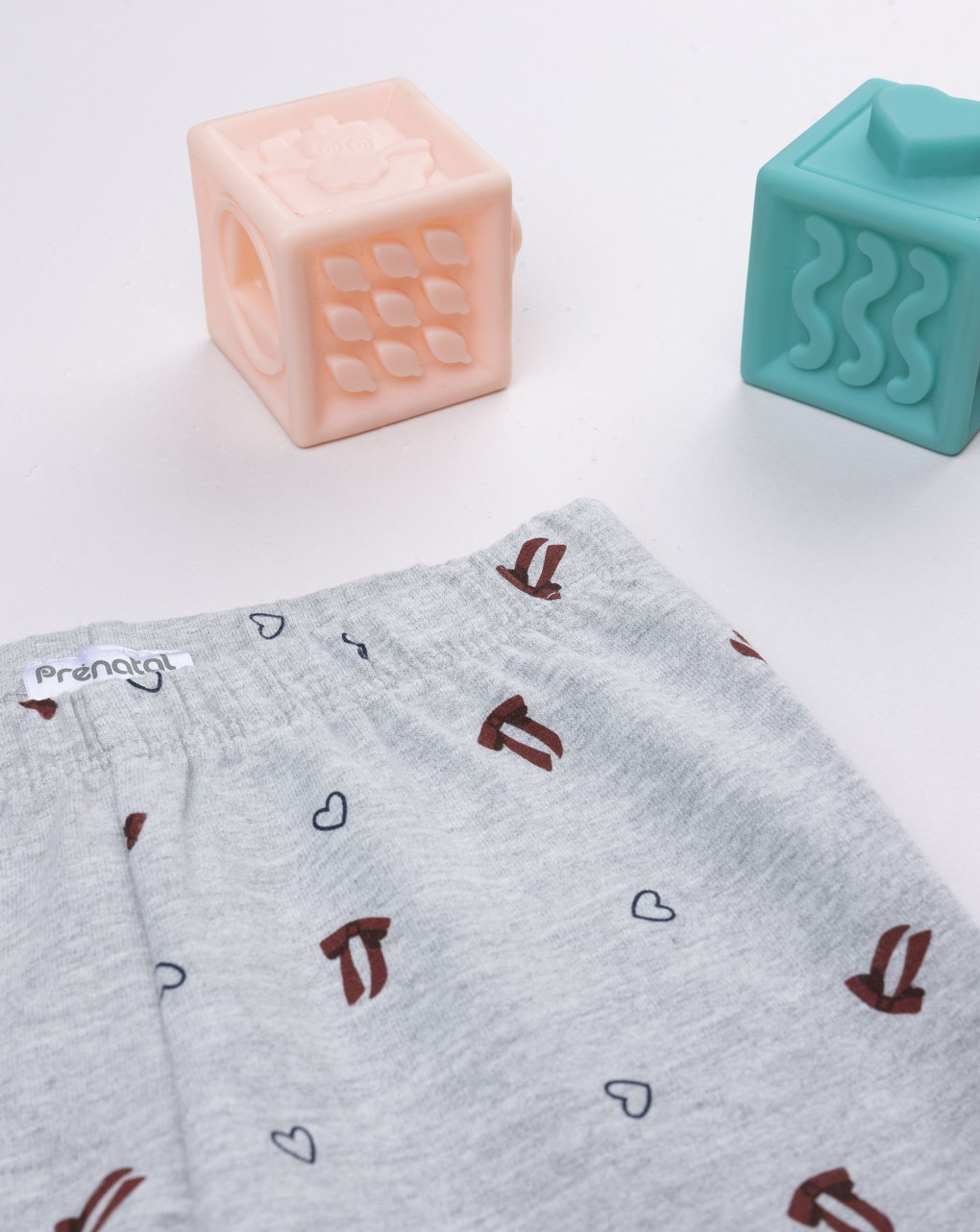 Legging bimba grigio fiocchi/cuori allover