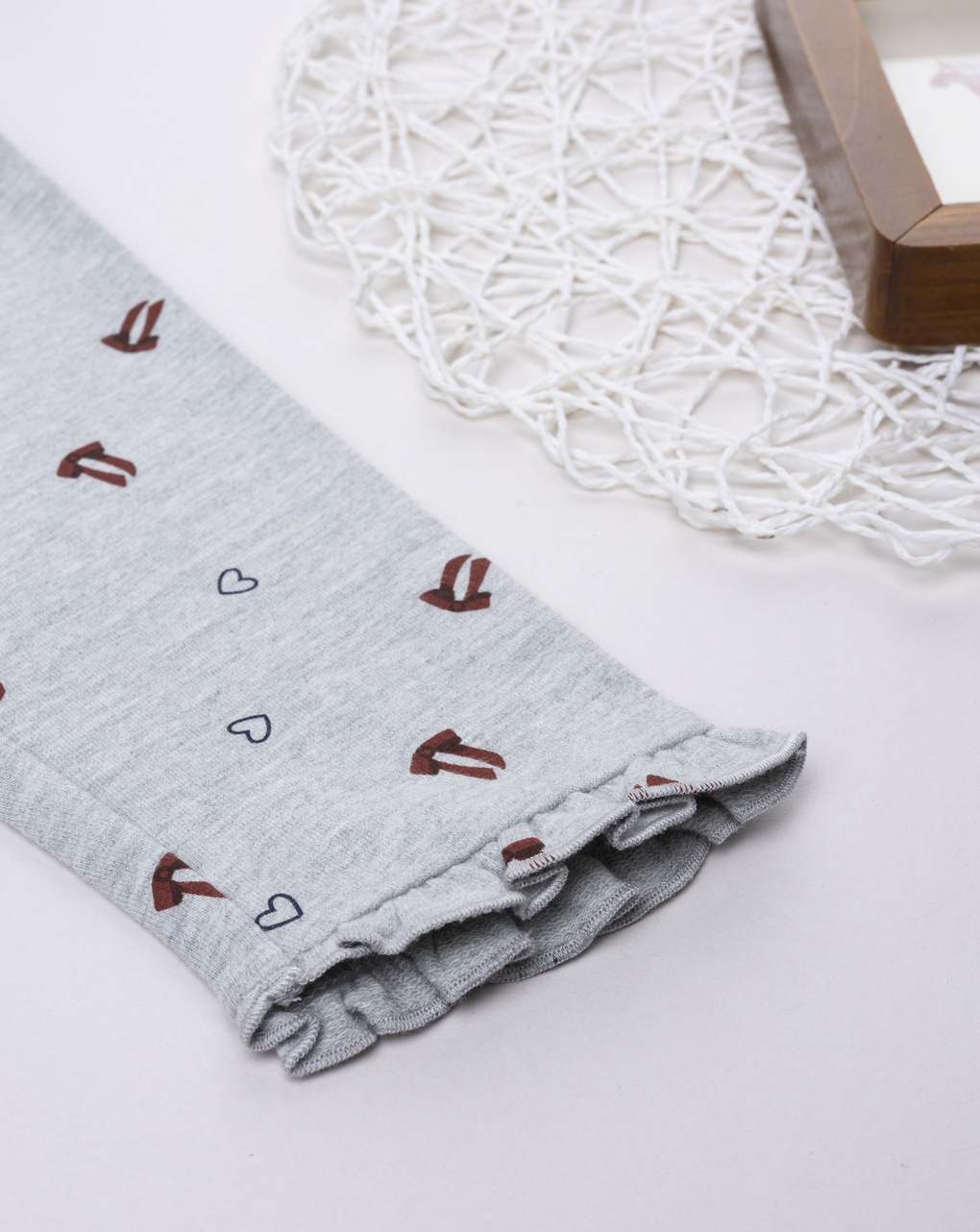 Legging bimba grigio fiocchi/cuori allover