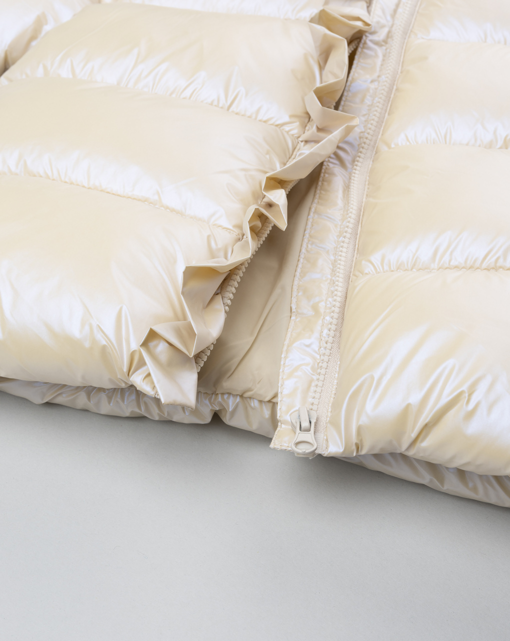 Piumino bimba beige laminato