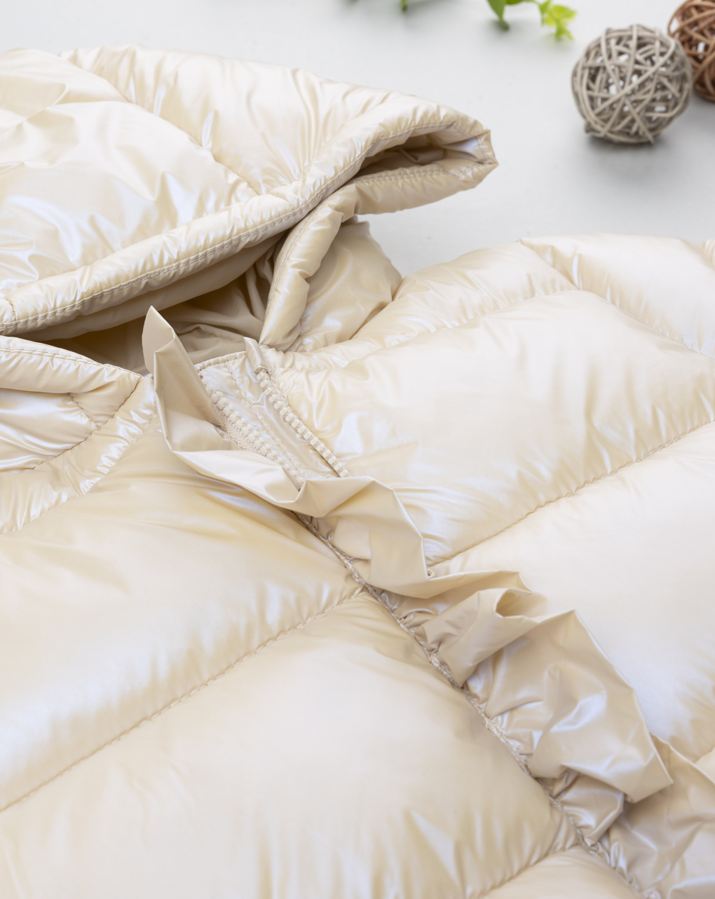 Piumino bimba beige laminato