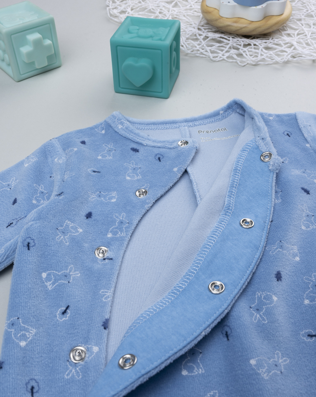 Tutina neonato azzurra coniglietti allover