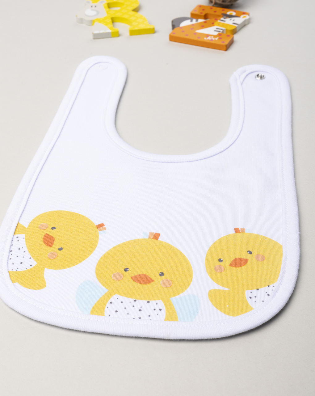 Bavaglino unisex bianco paperelle