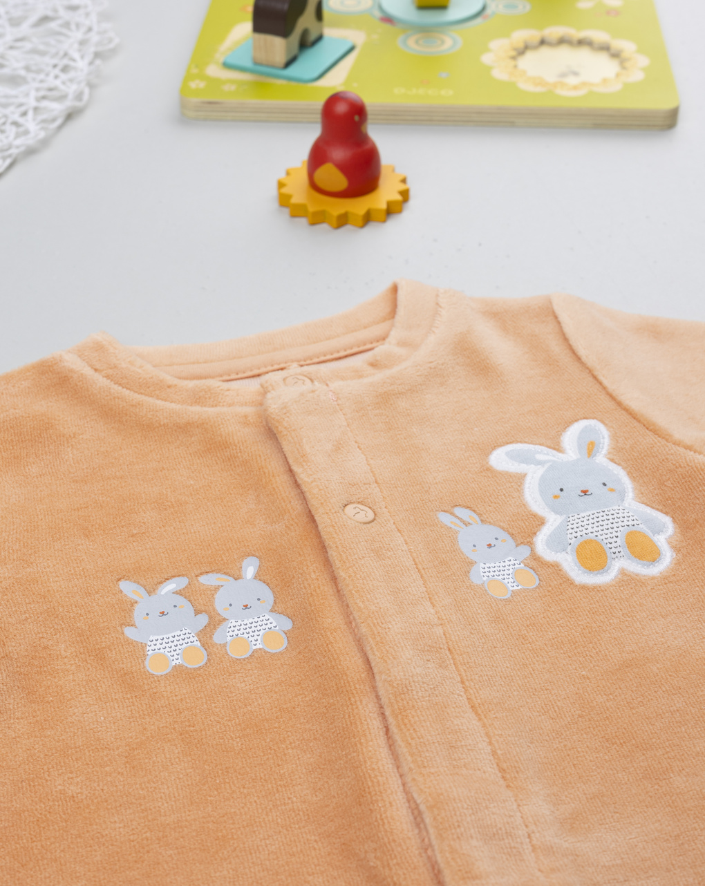 Tutina neonato unisex arancione coniglietti