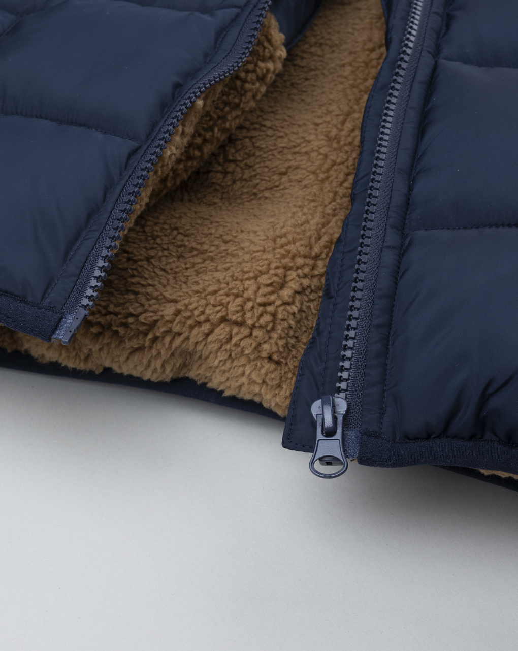 Piumino bimbo blu finto pelo