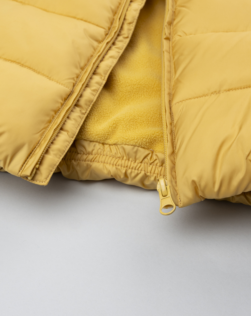 Piumino bimbo giallo pile interno