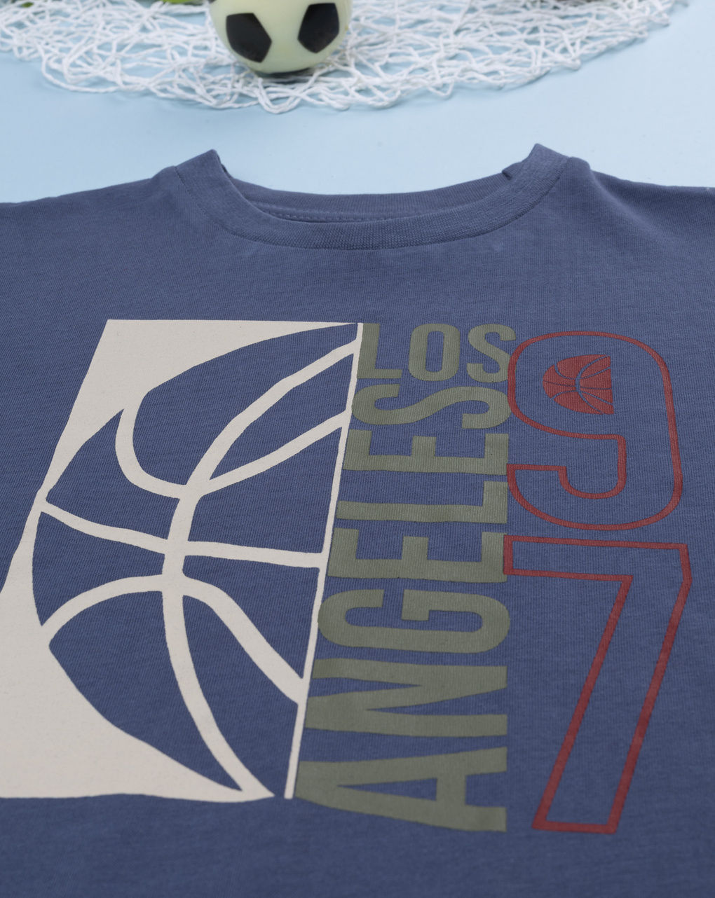 T-shirt bimbo blu stampata