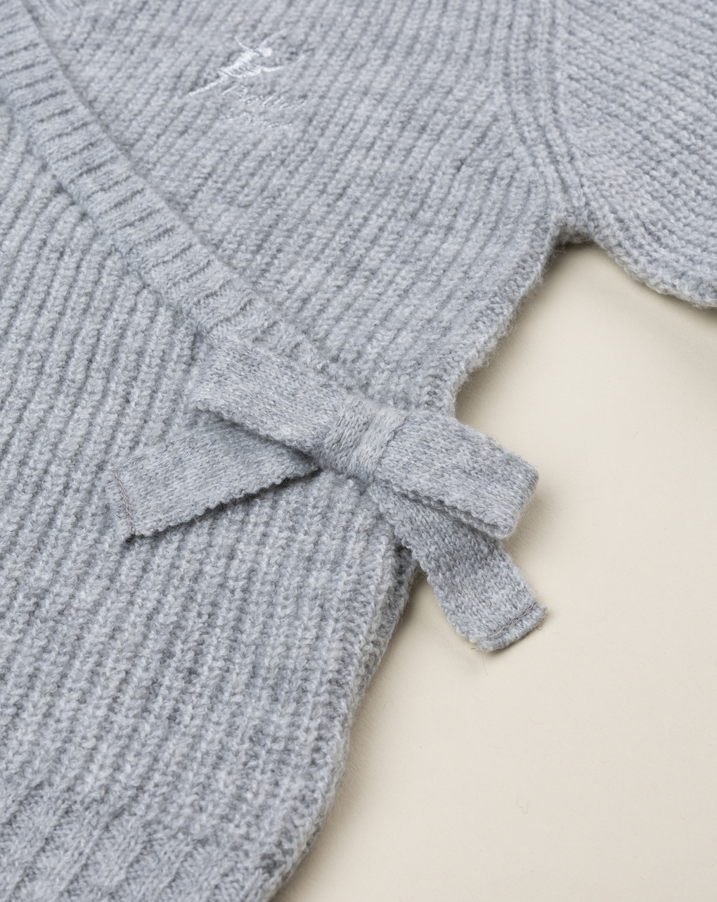 Cardigan bambina grigio con fiocco