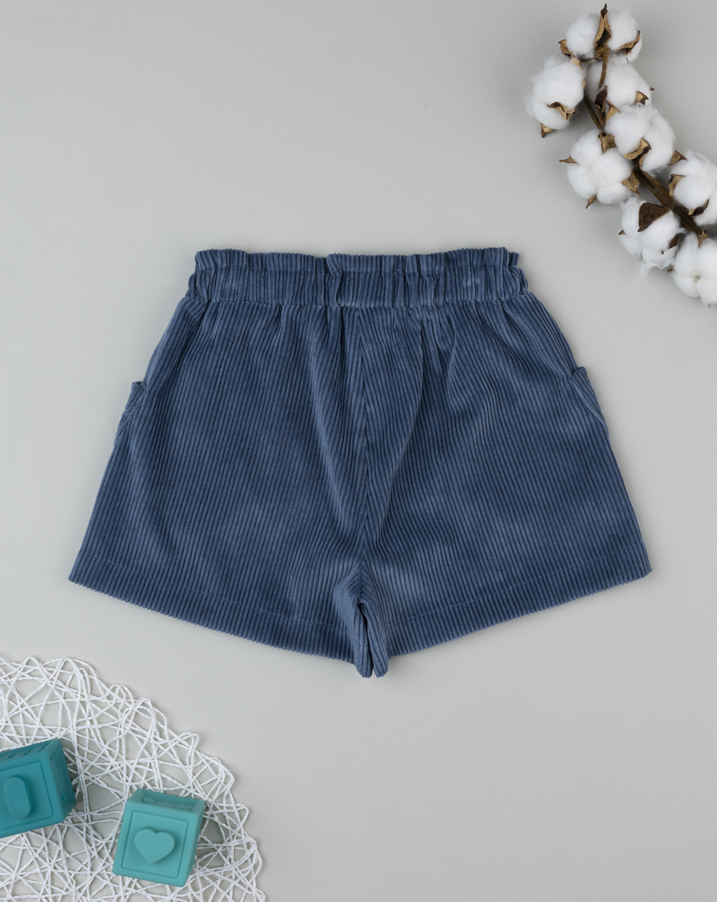 Shorts bimba blu con fiori