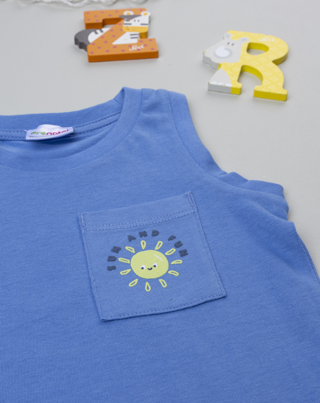 Canotta bimbo bluette taschino sole