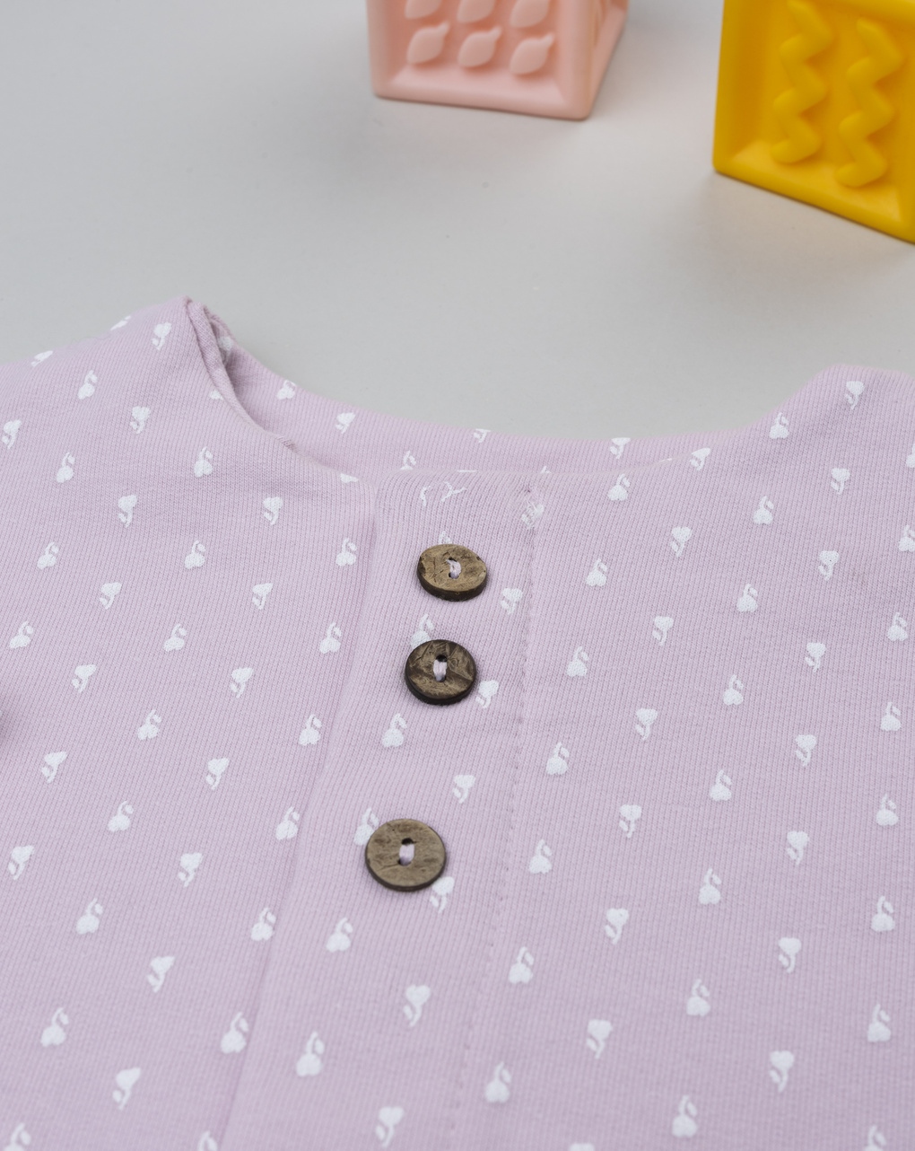 Cardigan neonata rosa con allover