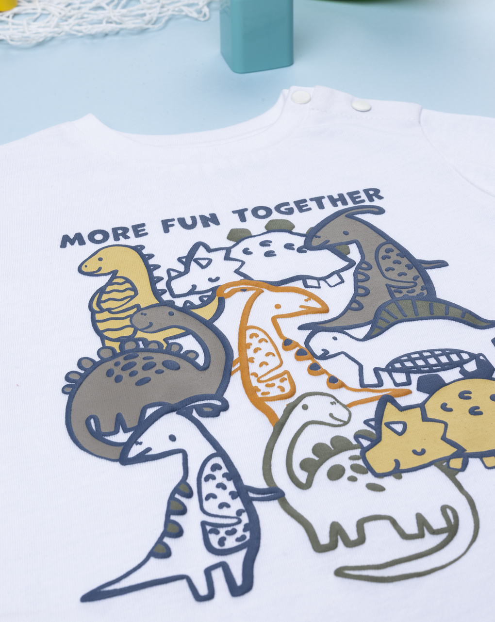 T-shirt bimbo bianca stampata dinosauri