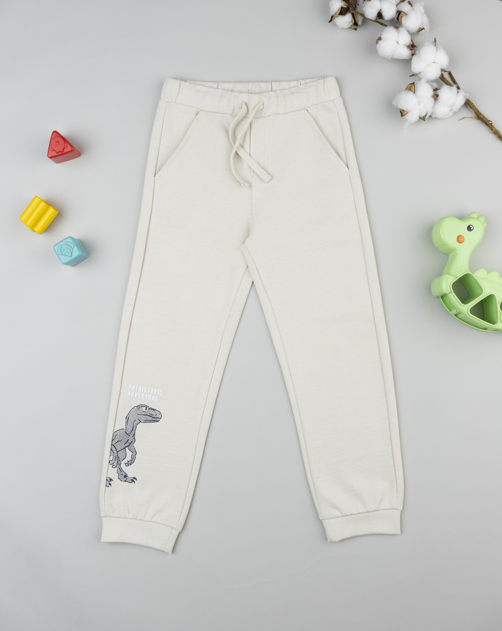 Pantalone bambino beige stampa rilievo