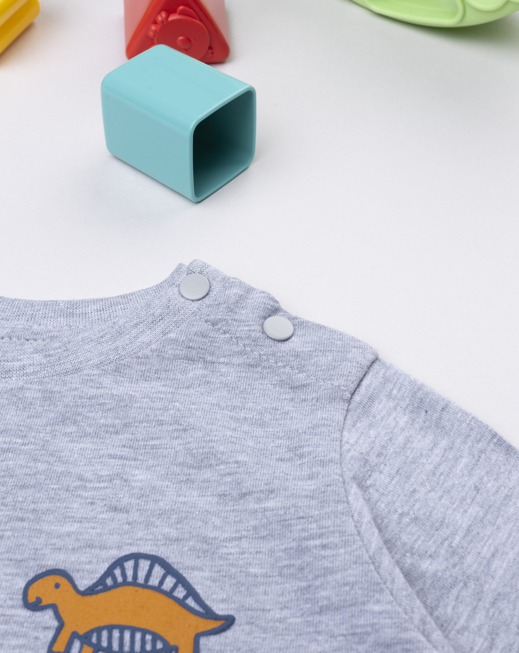 T-shirt bimbo grigia stampata dinosauri