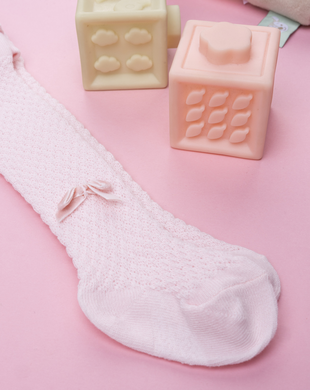 Collant neonata rosa con fiocchetto