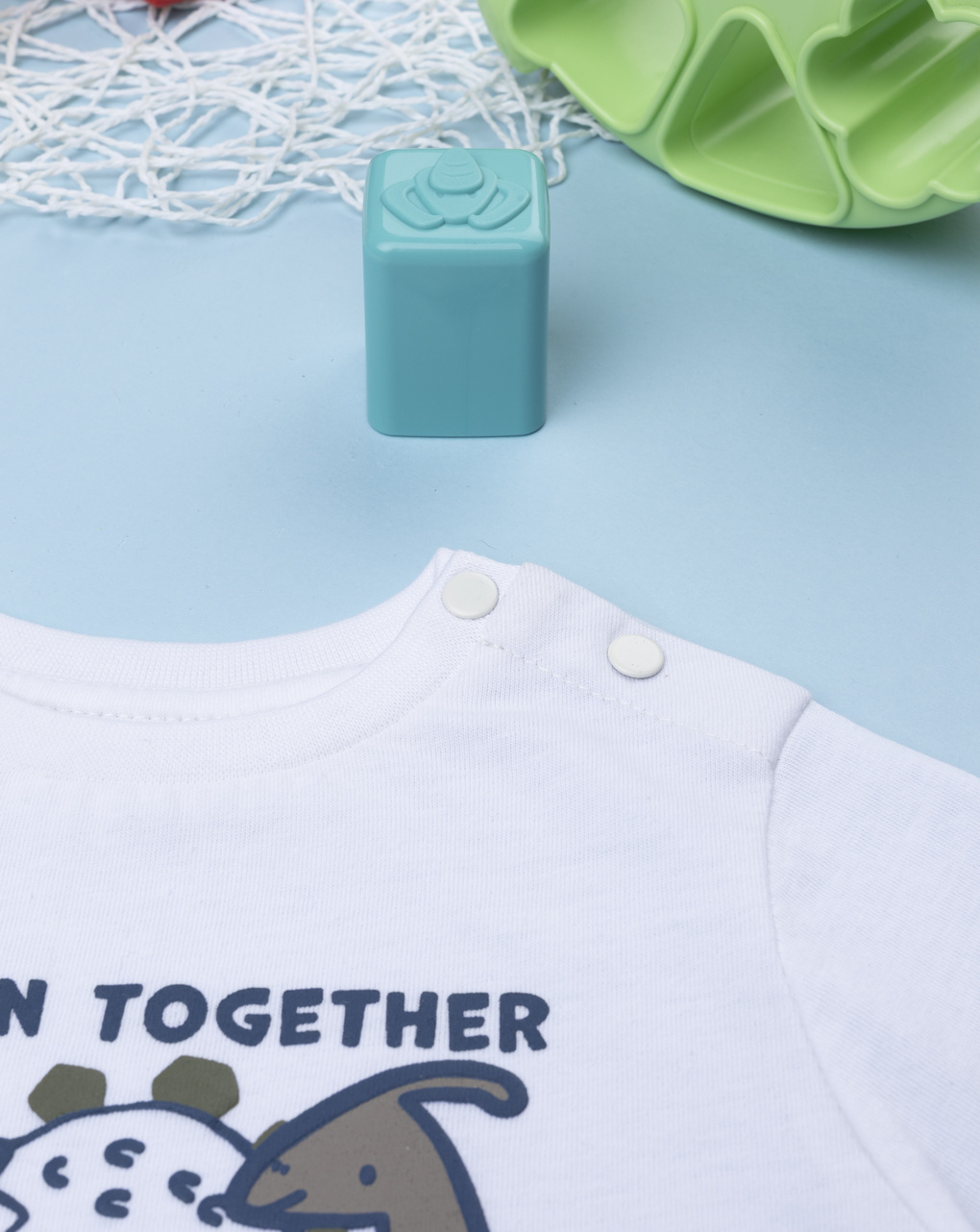 T-shirt bimbo bianca stampata dinosauri