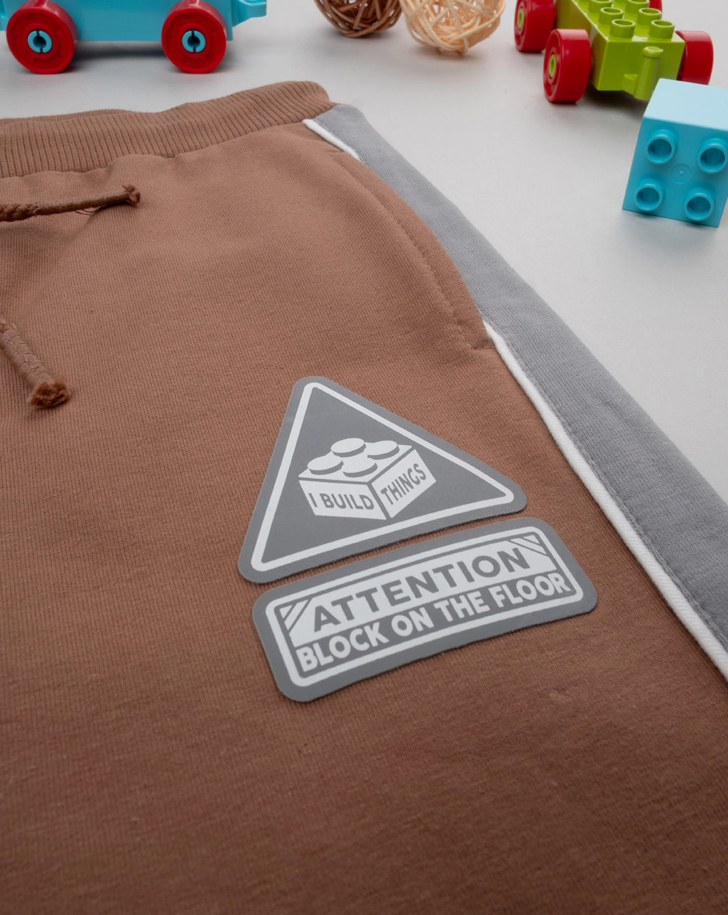 Pantalone bimbo marrone bande laterali